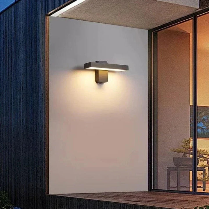 Garden motion sensor light, weatherproof, adjustable beam for targeted illumination.