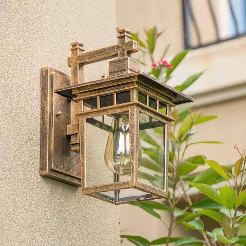 Black aluminum & clear glass waterproof wall lantern, ideal for outdoor patio & garden lighting.