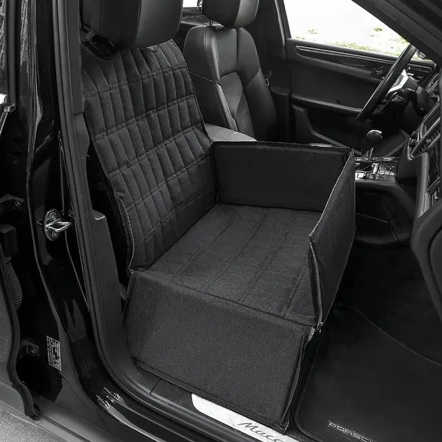 Portable dog car seat with plush padding and safety straps. Ideal for secure & comfy pet travel in any vehicle.