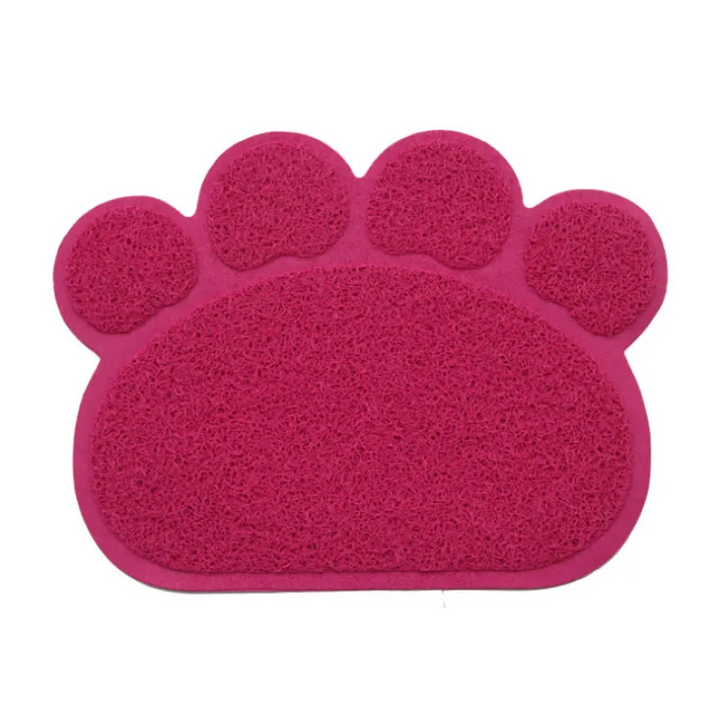 Resilient paw-shaped pet mat for litter control, ensuring a cleaner floor and less litter tracking.