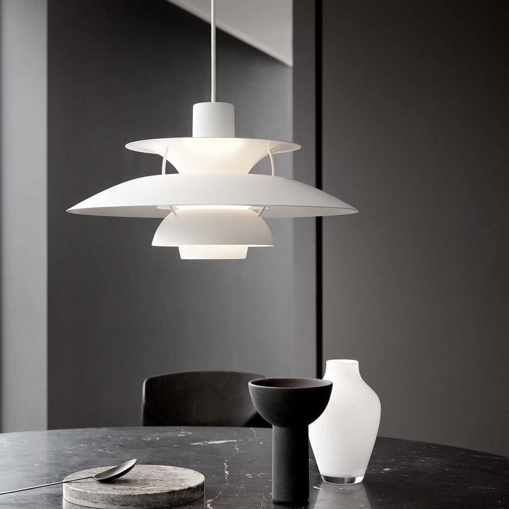Modern Paxano ceiling lamp, an adjustable pendant light for contemporary dining rooms.