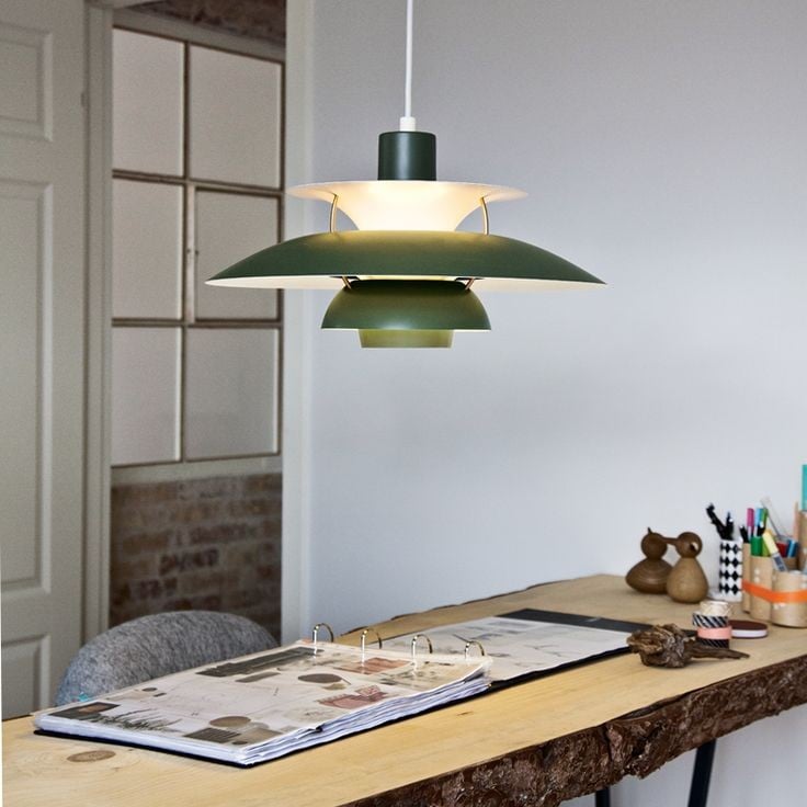 Accent lighting with Paxano modern pendant light, a sleek adjustable fixture.