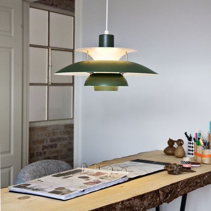 Accent lighting with Paxano modern pendant light, a sleek adjustable fixture.