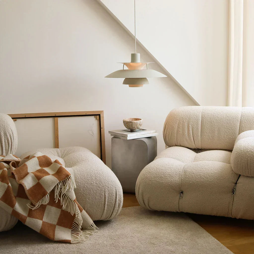 Designer Paxano pendant light, offering modern adjustable illumination for dining areas.