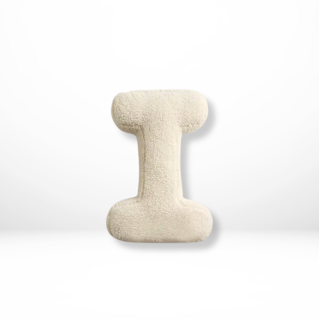 Personalized home decor velvet cushion, featuring a stylish initial for any room.