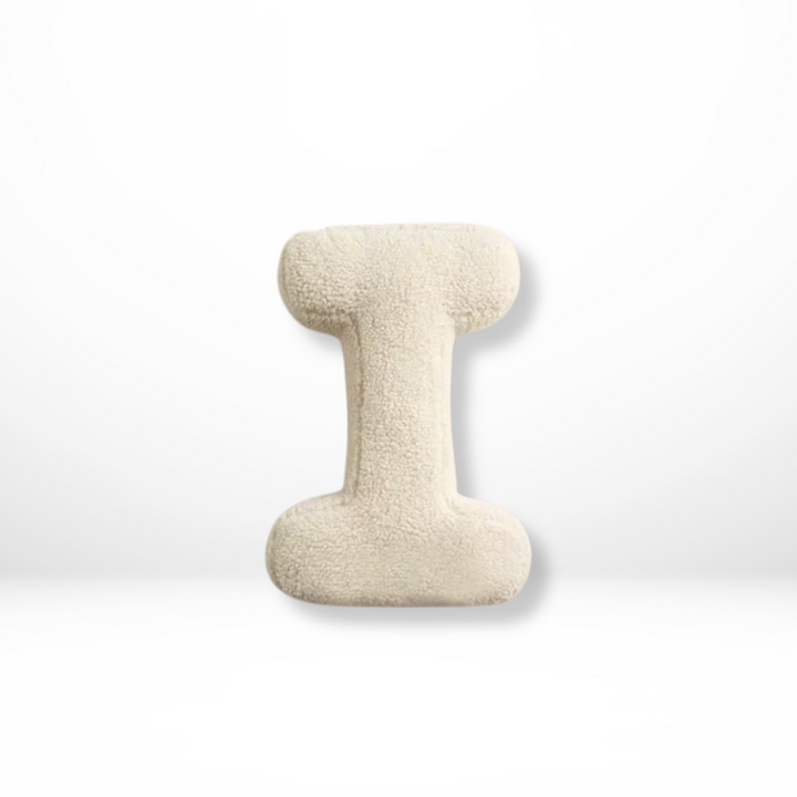 Personalized home decor velvet cushion, featuring a stylish initial for any room.