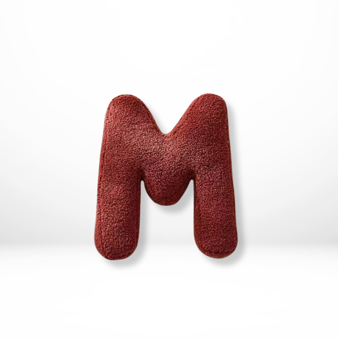 Custom initial velvet decorative pillow, a luxurious addition to any home decor scheme.
