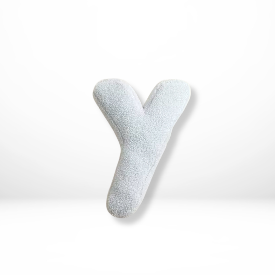 Custom velvet letter decorative cushion, adding a unique personalized touch to any room.