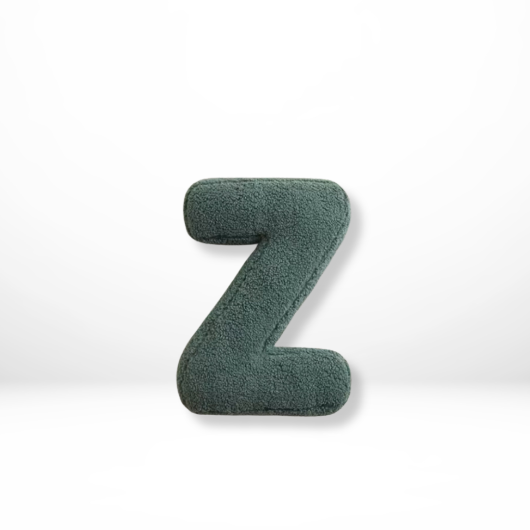 Stylish personalized alphabet velvet cushion, ideal for modern home decor accents.