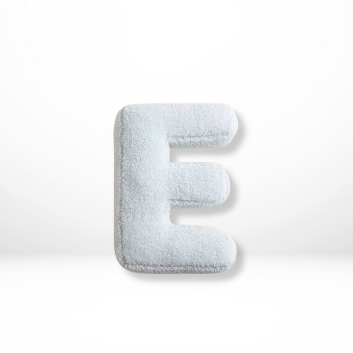 Personalized alphabet velvet decorative pillow, a luxurious touch for elegant home decor.