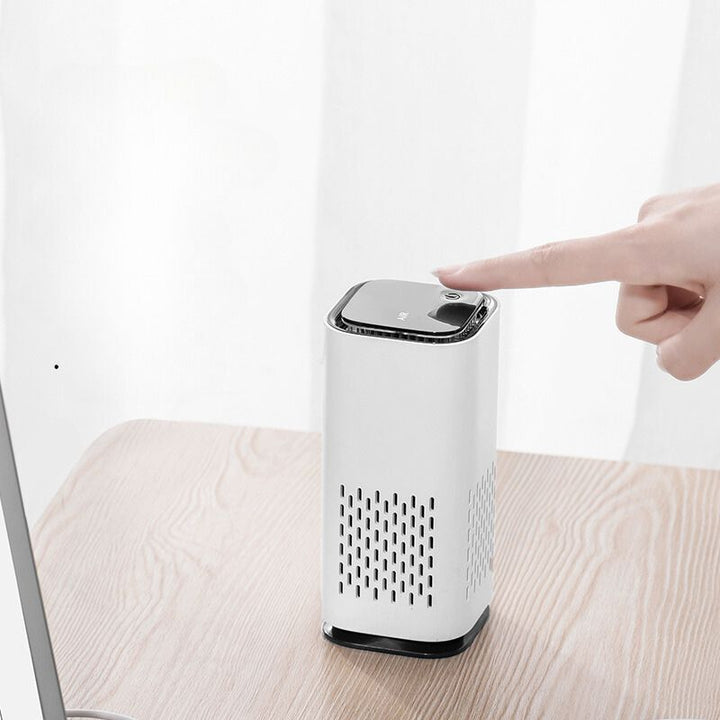 Compact pet air purifier designed for effective odor elimination and fresh air circulation.