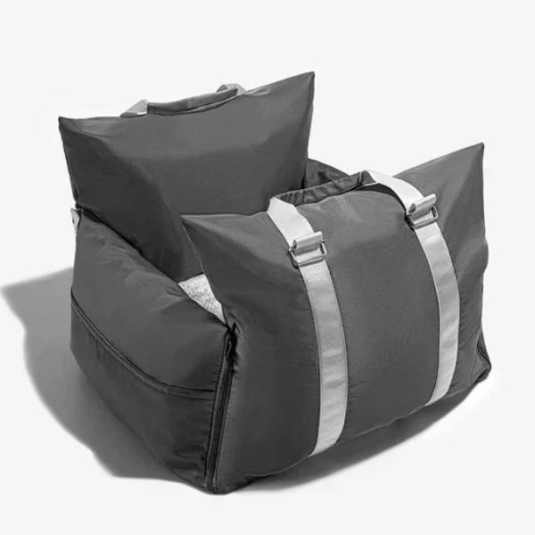 Enjoy road trips with this waterproof pet dog car seat bed. Safe, secure, and comfortable for your furry friend.