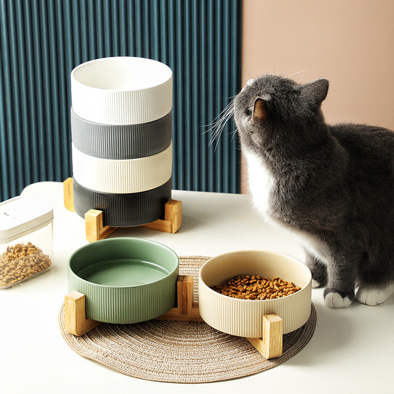 Pet feeding bowl set with elegant wooden stand, perfect for dogs & cats.