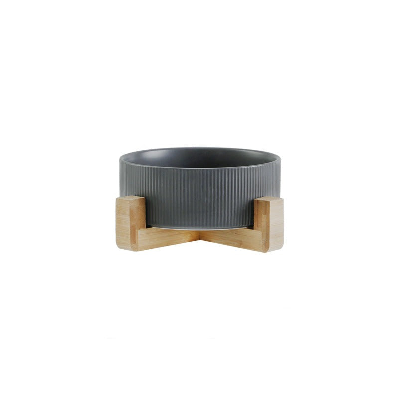 Two elevated ceramic pet bowls in a sturdy, stylish wooden stand for comfortable feeding.