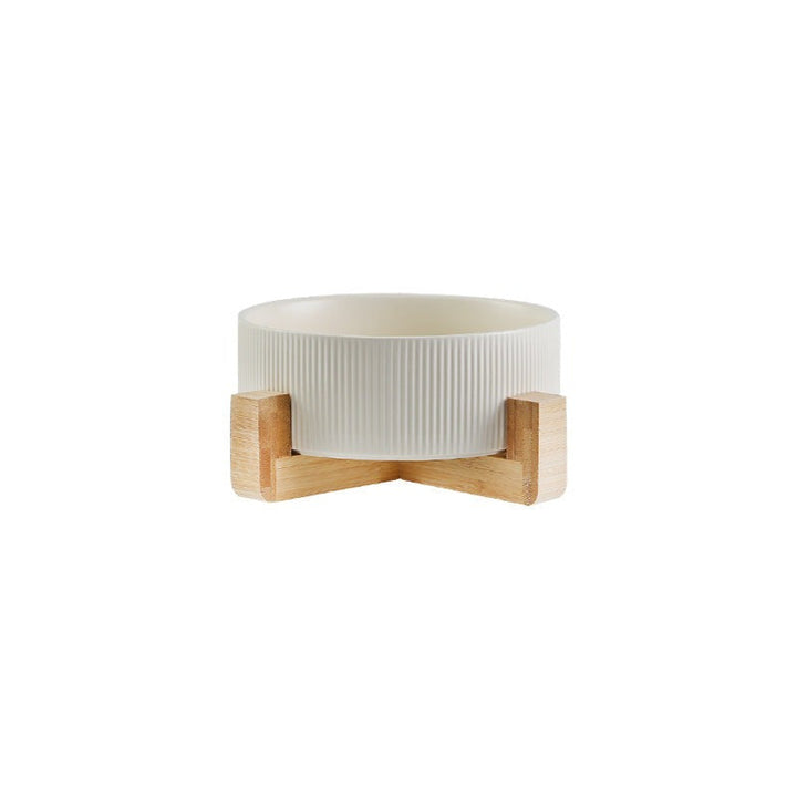 Modern pet accessory: a minimalist wooden stand supporting ceramic dog & cat food bowls.