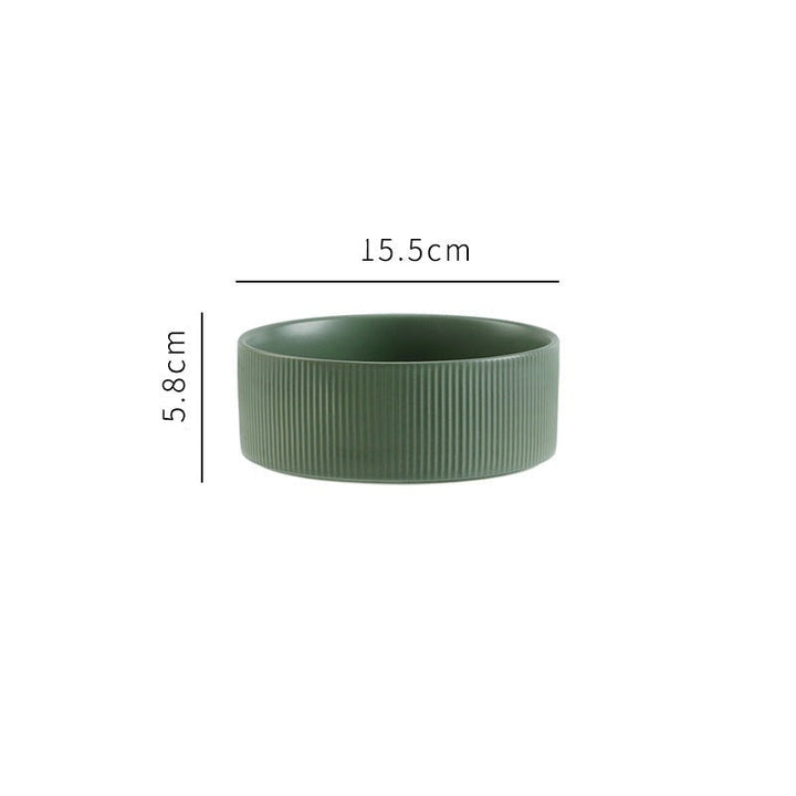 Modern pet bowl set featuring easy-to-clean ceramic dishes and a stable, elegant wooden stand.
