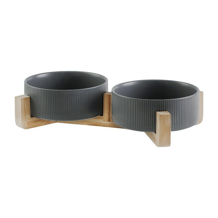 Premium pet feeding solution with ceramic bowls & an elegant solid wooden stand for pets.