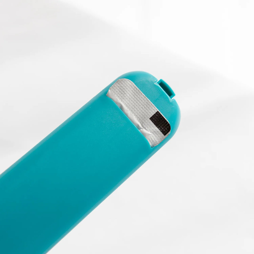 Slider pet food spoon for accurately dispensing wet food & paste to cats and dogs. Essential pet feeding accessory.
