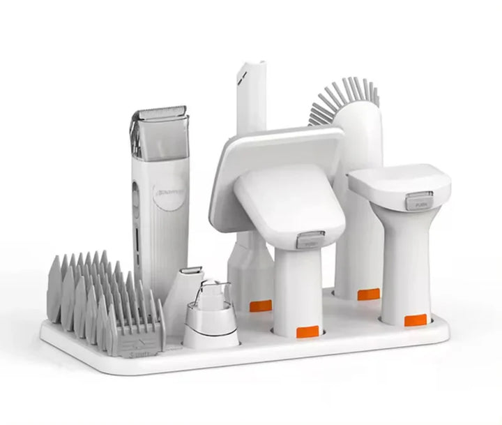 Advanced pet hair trimmer for dogs & cats, featuring an integrated vacuum for easy, mess-free animal grooming.