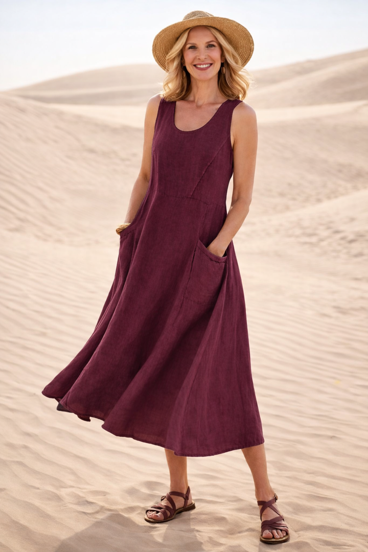 Sleeveless A-line midi dress for women, offering comfortable and versatile everyday style with pockets.