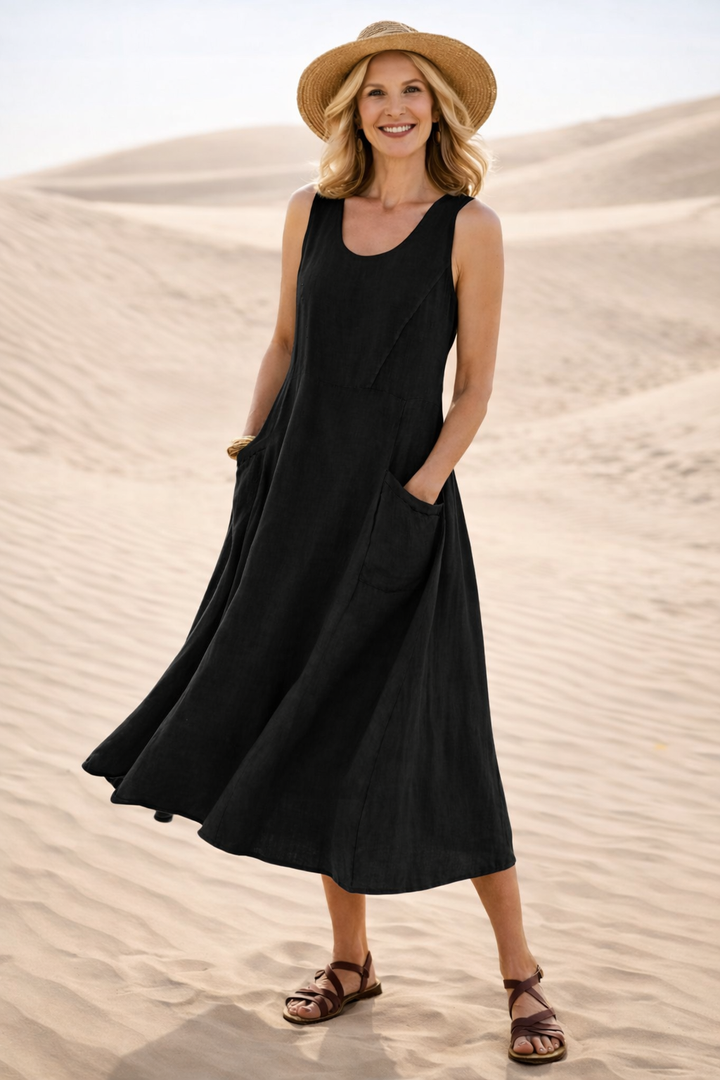 Versatile pink A-line midi dress for women. Sleeveless and comfortable, perfect for summer everyday wear.