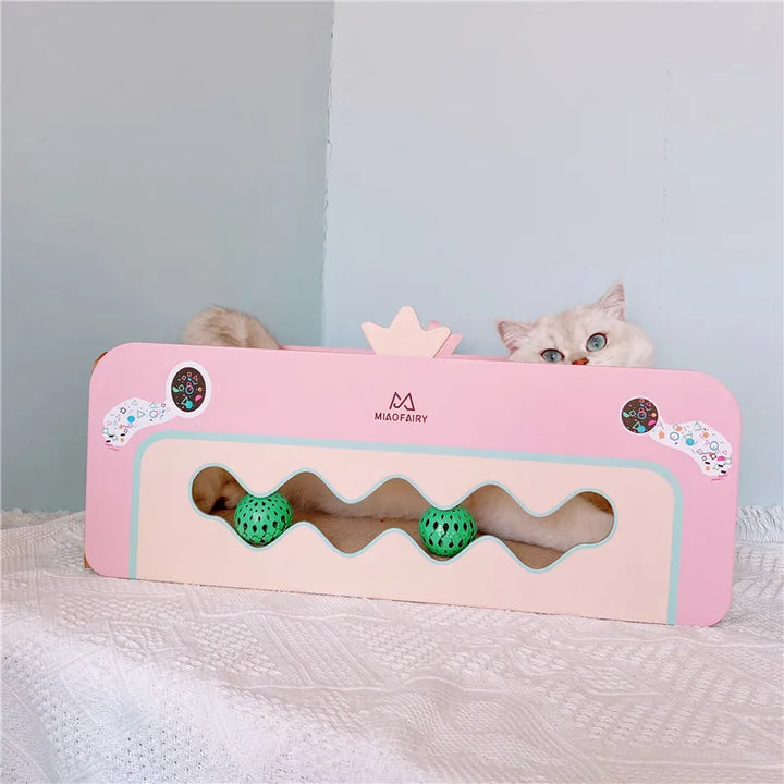 Pet scratching box in pink for cats, a fun activity toy & furniture protector.
