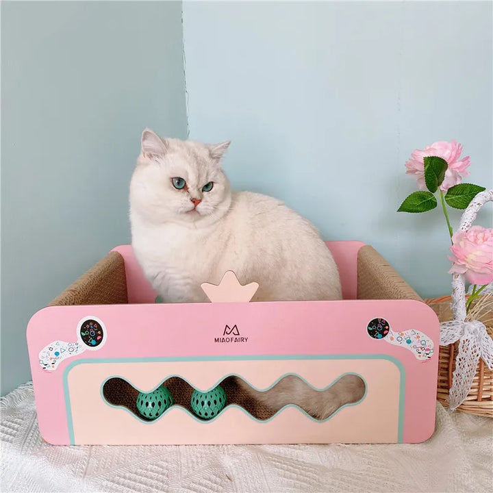 Stylish pink scratching box offers cats an activity toy & protects home furniture from scratches.
