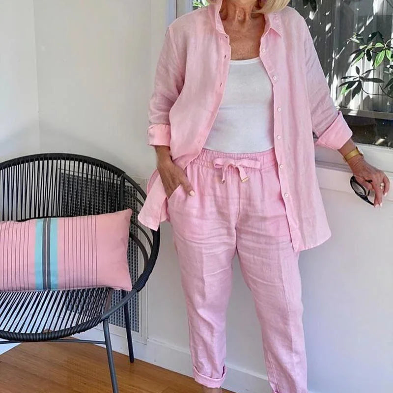 Pink denim jacket & drawstring pants women's two-piece set. Casual, comfortable spring/summer fashion.