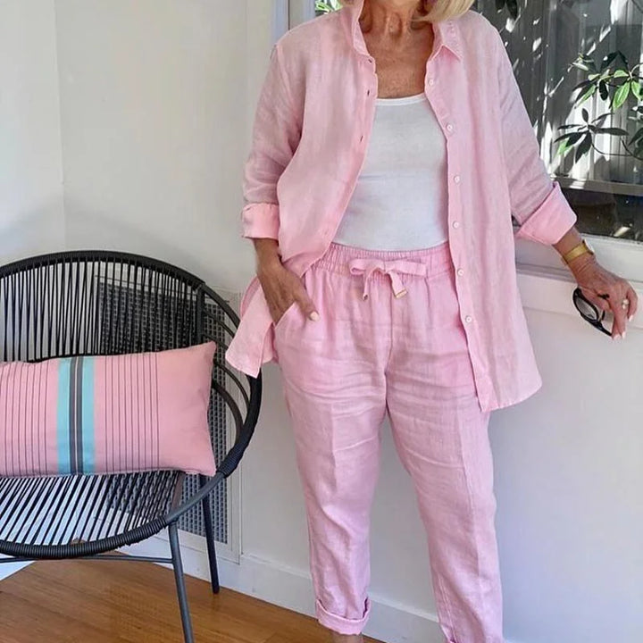 Pink denim jacket & drawstring pants women's two-piece set. Casual, comfortable spring/summer fashion.