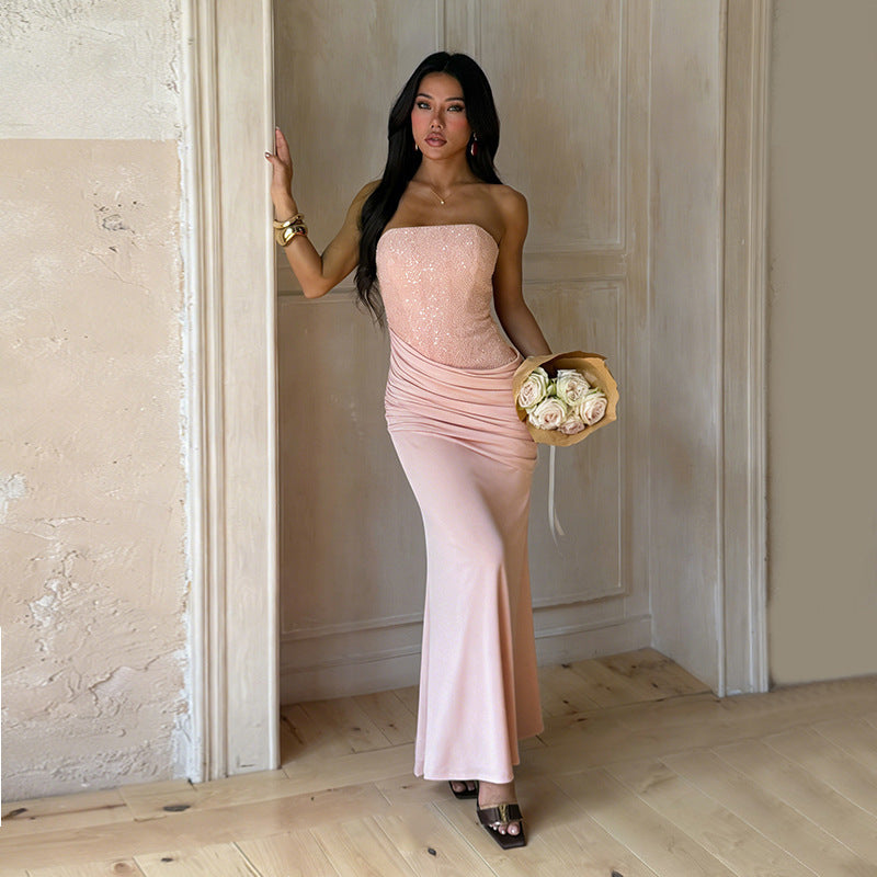 Elegant pink ruched strapless maxi dress for women, a stylish choice for formal occasions & evening wear.