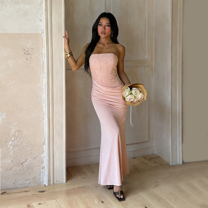 Elegant pink ruched strapless maxi dress for women, a stylish choice for formal occasions & evening wear.