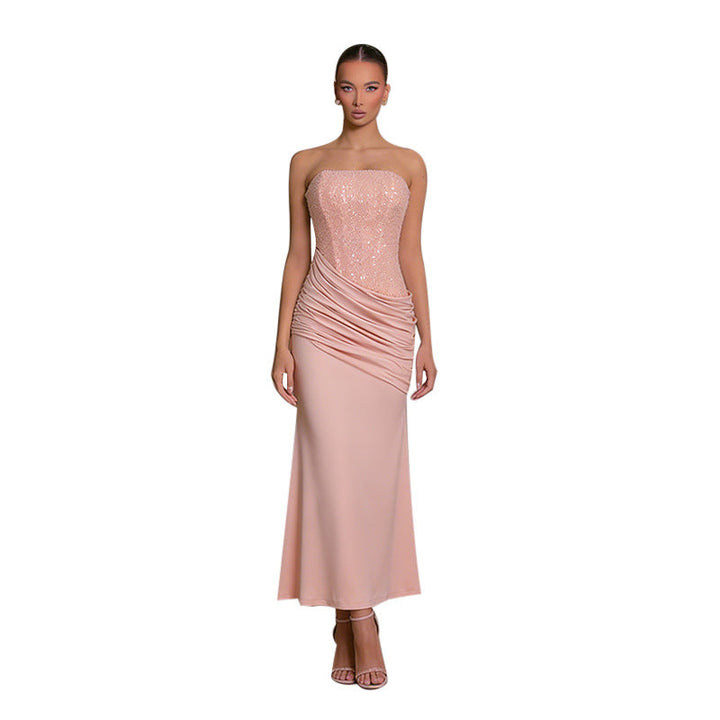 Pink strapless ruched bodycon maxi dress for women. Elegant formal evening gown.