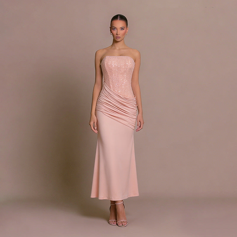 Elegant pink women's strapless ruched bodycon maxi dress, suitable for formal events & evening wear.