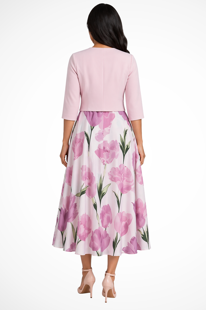 Two-piece women's formal set: elegant pink floral maxi dress & chic cropped jacket, ideal for wedding guests.