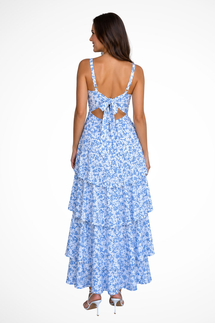 Elegant women's strappy tiered floral maxi dress with ruffles, a chic choice for wedding guests & summer occasions.