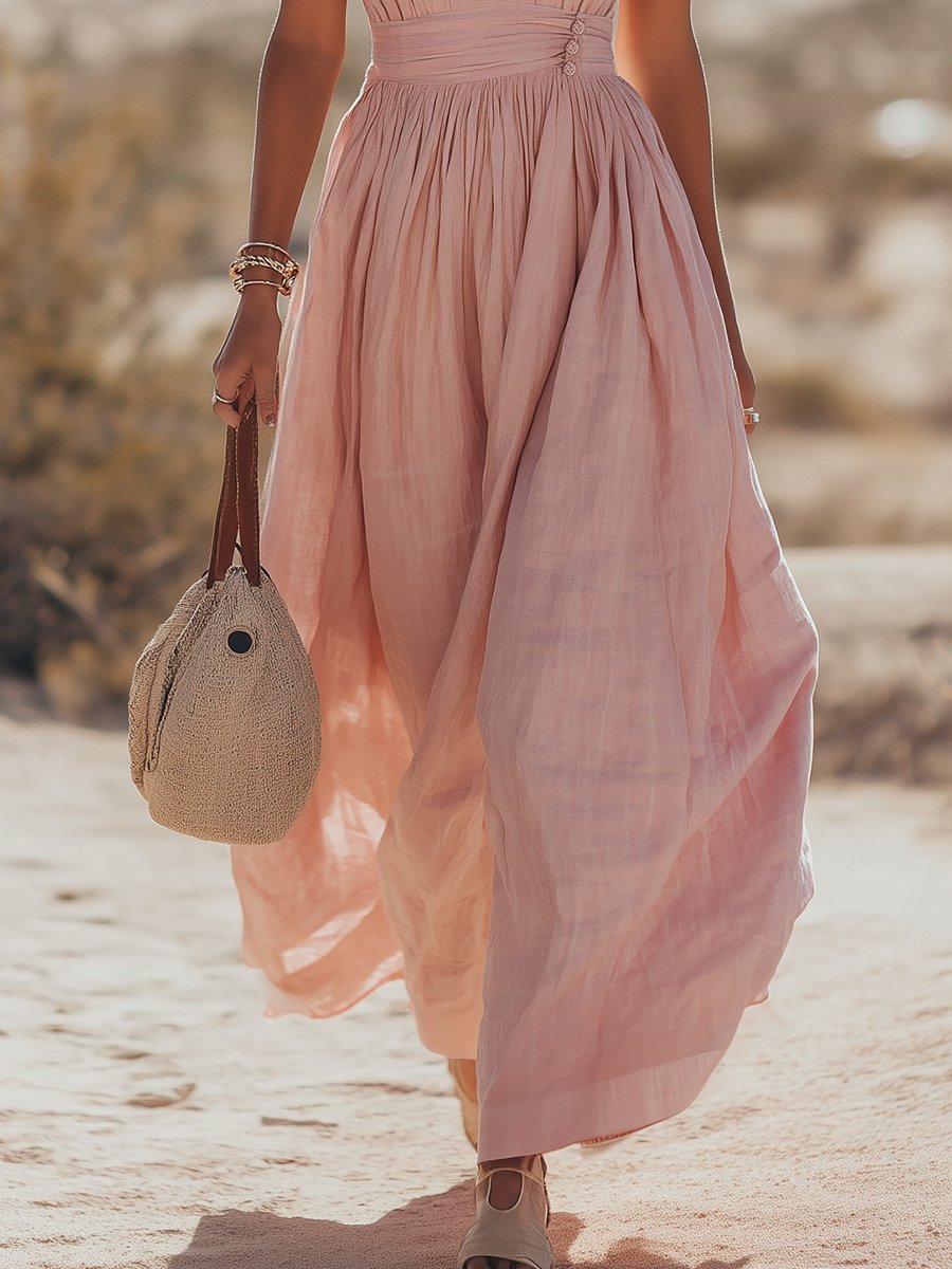 Pink flowing halterneck maxi dress for women. Perfect casual summer dress or vacation outfit.