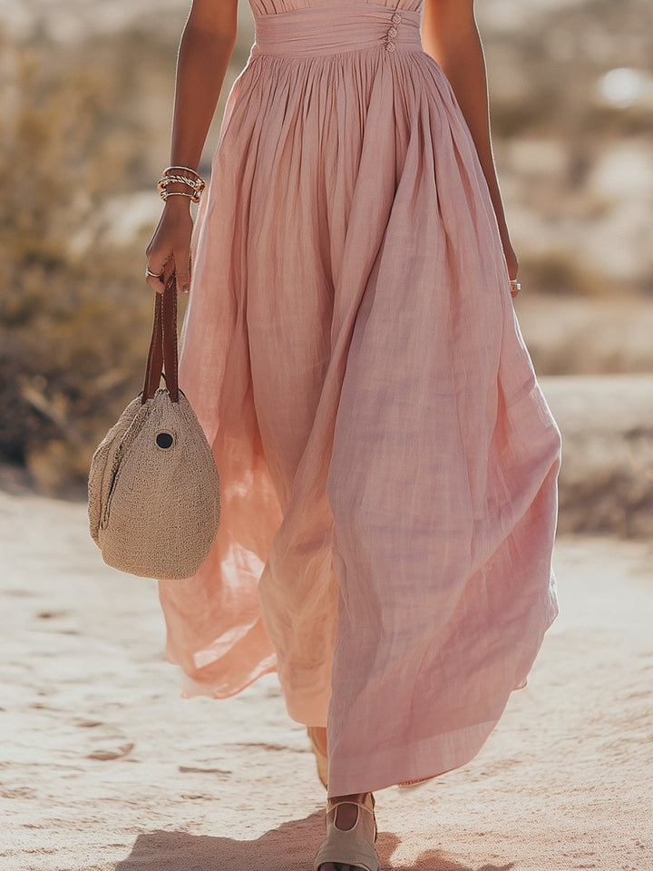Pink flowing halterneck maxi dress for women. Perfect casual summer dress or vacation outfit.