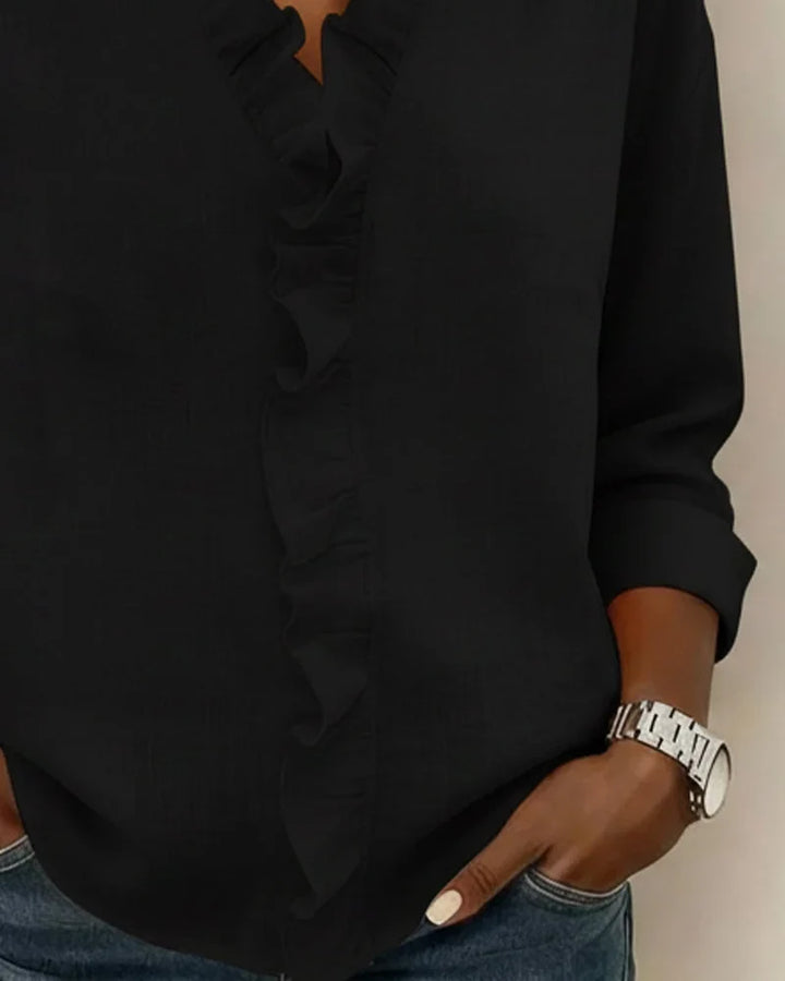 Versatile pink women's long-sleeve blouse with ruffle V-neck. Relaxed fit, an elegant choice for spring style.