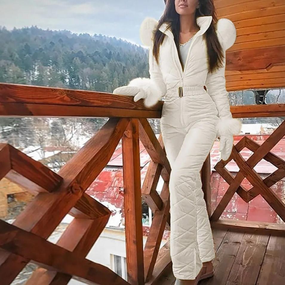 Close-up on the durable fabric of a women's weather-resistant snowboard overall