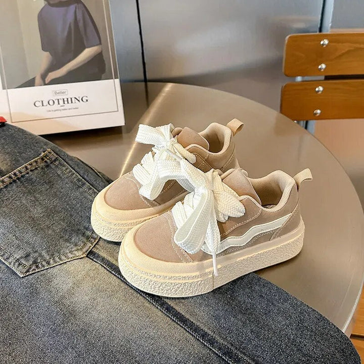 Comfy brown kids sneakers with playful style, perfect everyday wear for active boys & girls.