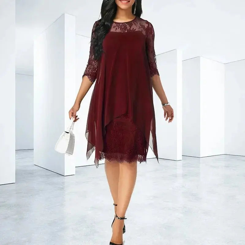 Plus size women's chiffon quarter sleeve dress with elegant lace detail & chic asymmetric hem for formal occasions.