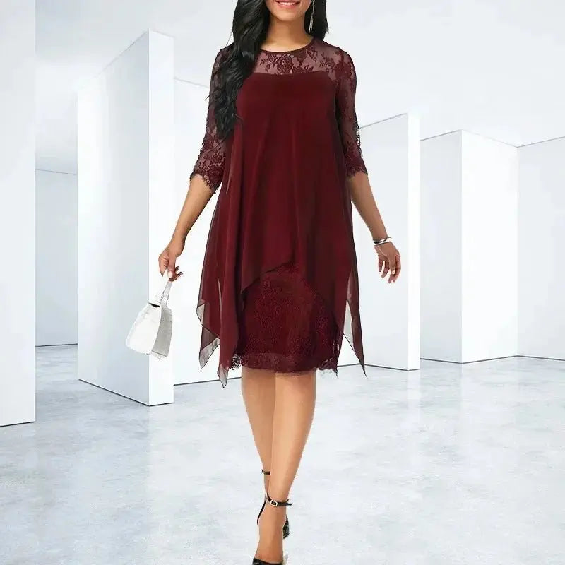 Stunning plus size wedding guest chiffon dress: quarter sleeve, elegant lace, and modern asymmetric hemline.