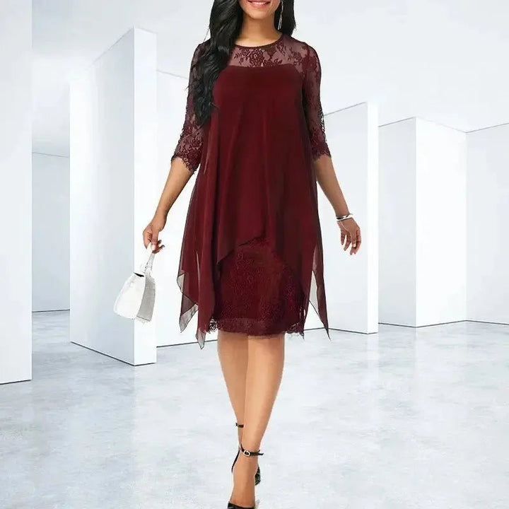 Stunning plus size wedding guest chiffon dress: quarter sleeve, elegant lace, and modern asymmetric hemline.