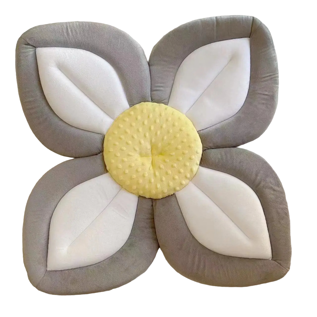 Plush Blooming Bath Seat in pink, a soft flower-shaped baby bath accessory