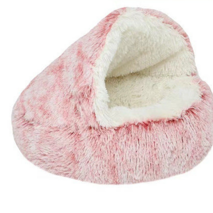 Plush cat cuddle cave pet bed with a cozy hood for warmth. Washable for easy care and pet comfort.
