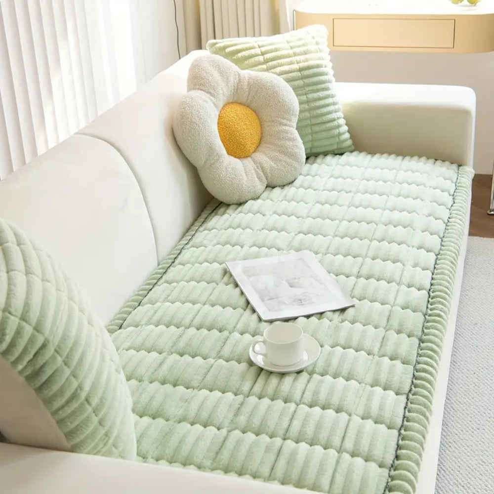 Plush fleece sofa protector mat with non-slip backing, ideal for furniture protection.