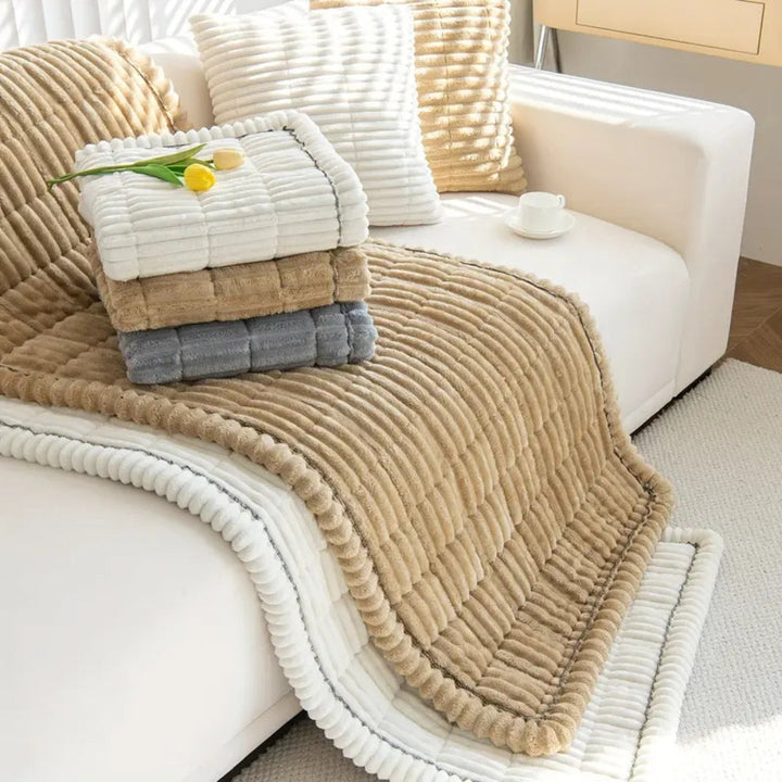 Keep your sofa pristine with non-slip plush fleece protector mat, pet-friendly & easy-clean.