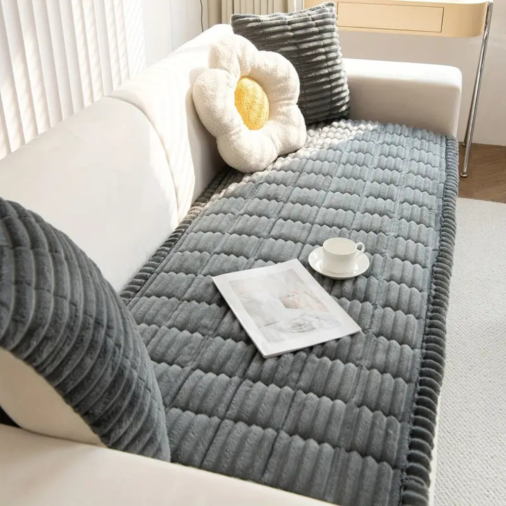 Washable non-slip sofa protector mat, fleece texture, protects furniture from pets & spills.