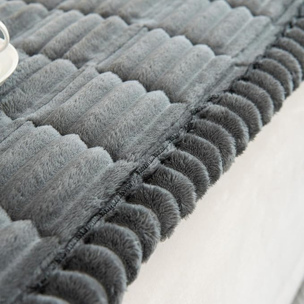 Easy-to-use non-slip sofa protector, plush fleece, provides immediate furniture protection.