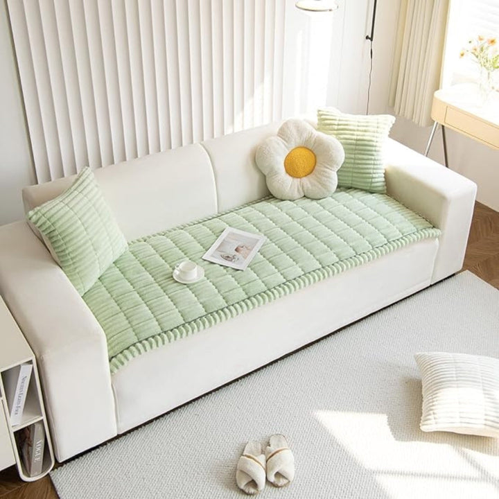 Washable plush fleece sofa protector, non-slip backing, clean and cozy living room.